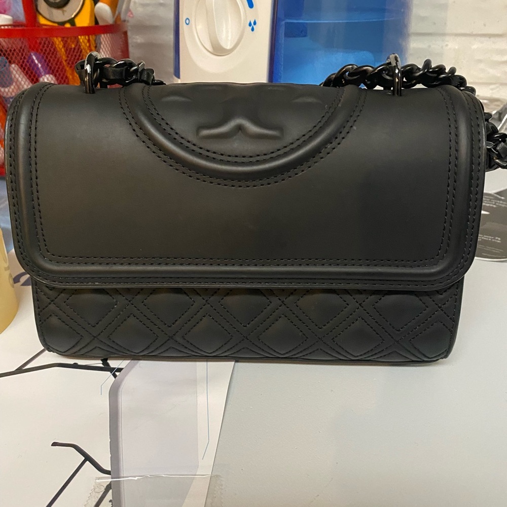 Love this bag.Pictures updated. Very Good condition. Dustbag included.